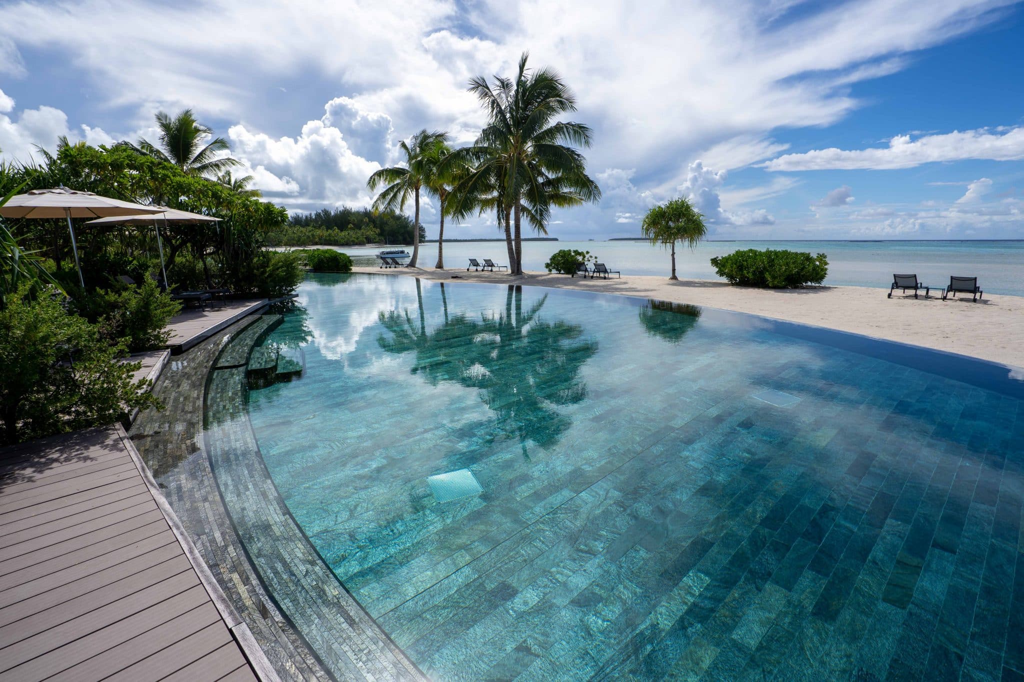 The Brando poolside view overlooking the pristine, turquoise waters and breathtaking archipelagos of the vast South Pacific.